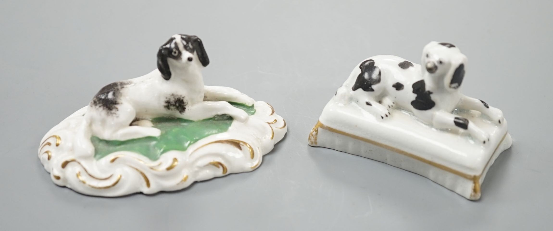 Two Staffordshire porcelain models of recumbent king Charles spaniel‘s, c.1835-50, largest 8.2 cm long, Cf. Dennis G.Rice Dogs in English porcelain, colour plate 146., Provenance: Dennis G.Rice collection